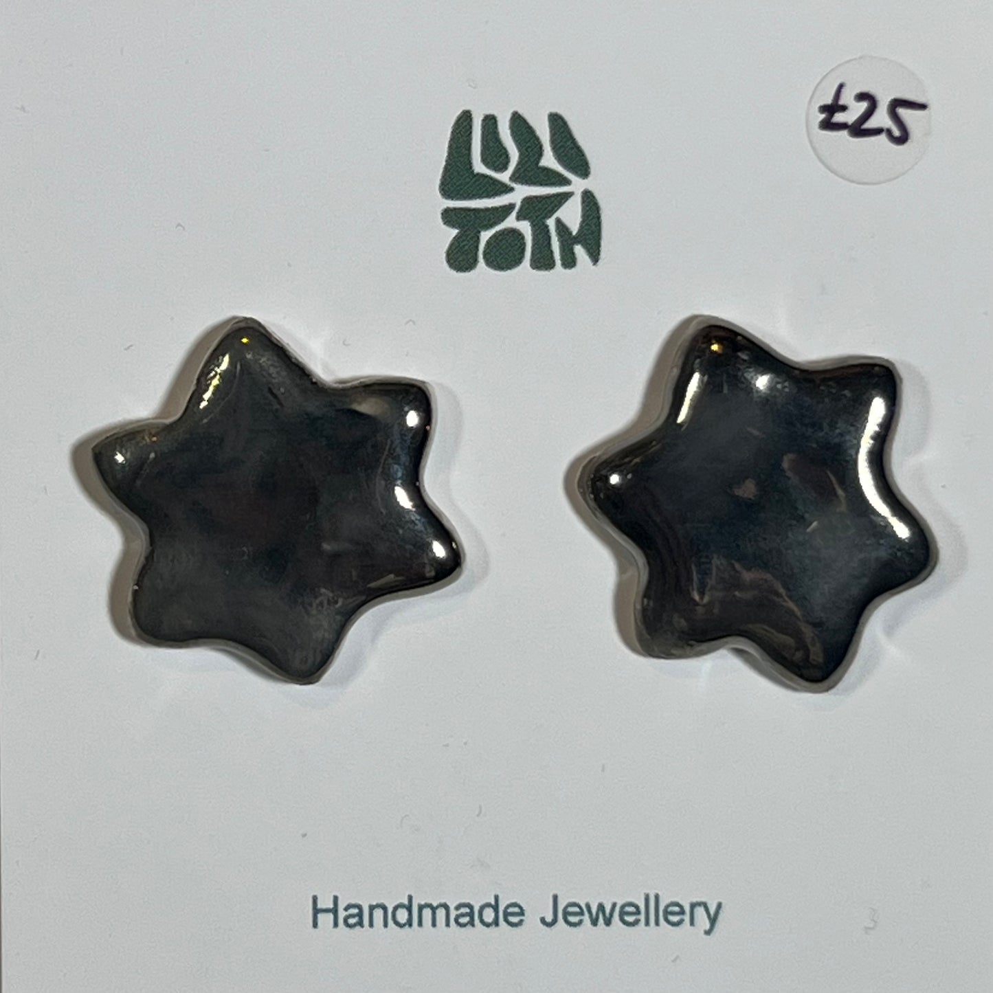 Glossy Black Ceramic Star Stud Earrings by Lili Toth