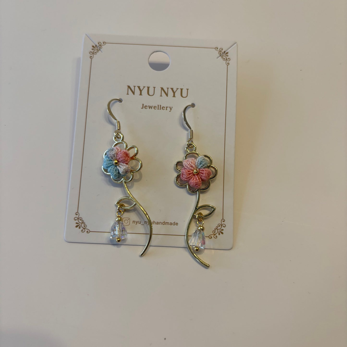 Micro Crochet Pink And Blue Flower Earrings With Stem And Bead by NYU