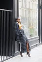 Amina, Black and White Kente Pencil Skirt with Front Slit by Nyny Ryke