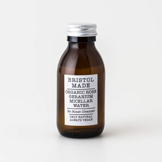 Brown bottle of Bristol Made organic rose geranium micellar water on a white background