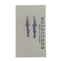 A pair of dangling earrings with faceted purple beads on a light gray display card. The card has the brand name 'eclectera' printed vertically on the right side.