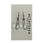 A pair of silver-toned drop earrings with faceted clear teardrop-shaped crystal pendants, displayed on a light gray card printed with the brand name 'eclectera made in London'.
