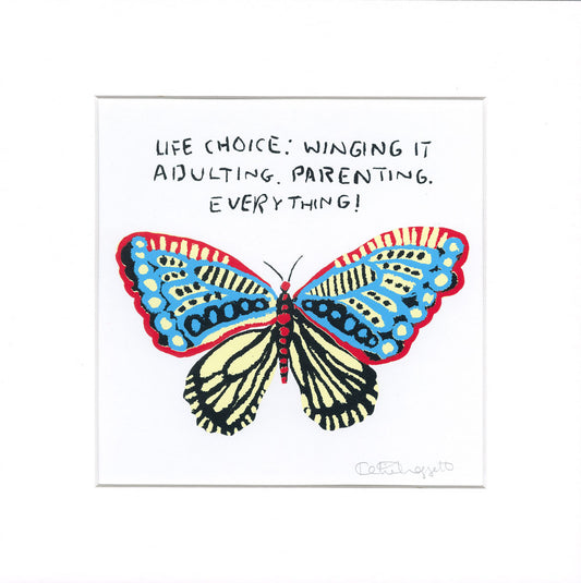 A square art print featuring a colorful illustrated butterfly with blue, red, black, and cream wings on a white background, with handwritten text above reading, 'LIFE CHOICE: WINGING IT ADULTING. PARENTING.