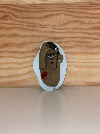 Face brooch 