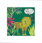A square art print featuring a colorful, patterned lion surrounded by tropical plants on a dark green background, with a speech bubble that reads 'FERAL KIDS HANG OUT HERE!'. The print is centered on a wide white border.