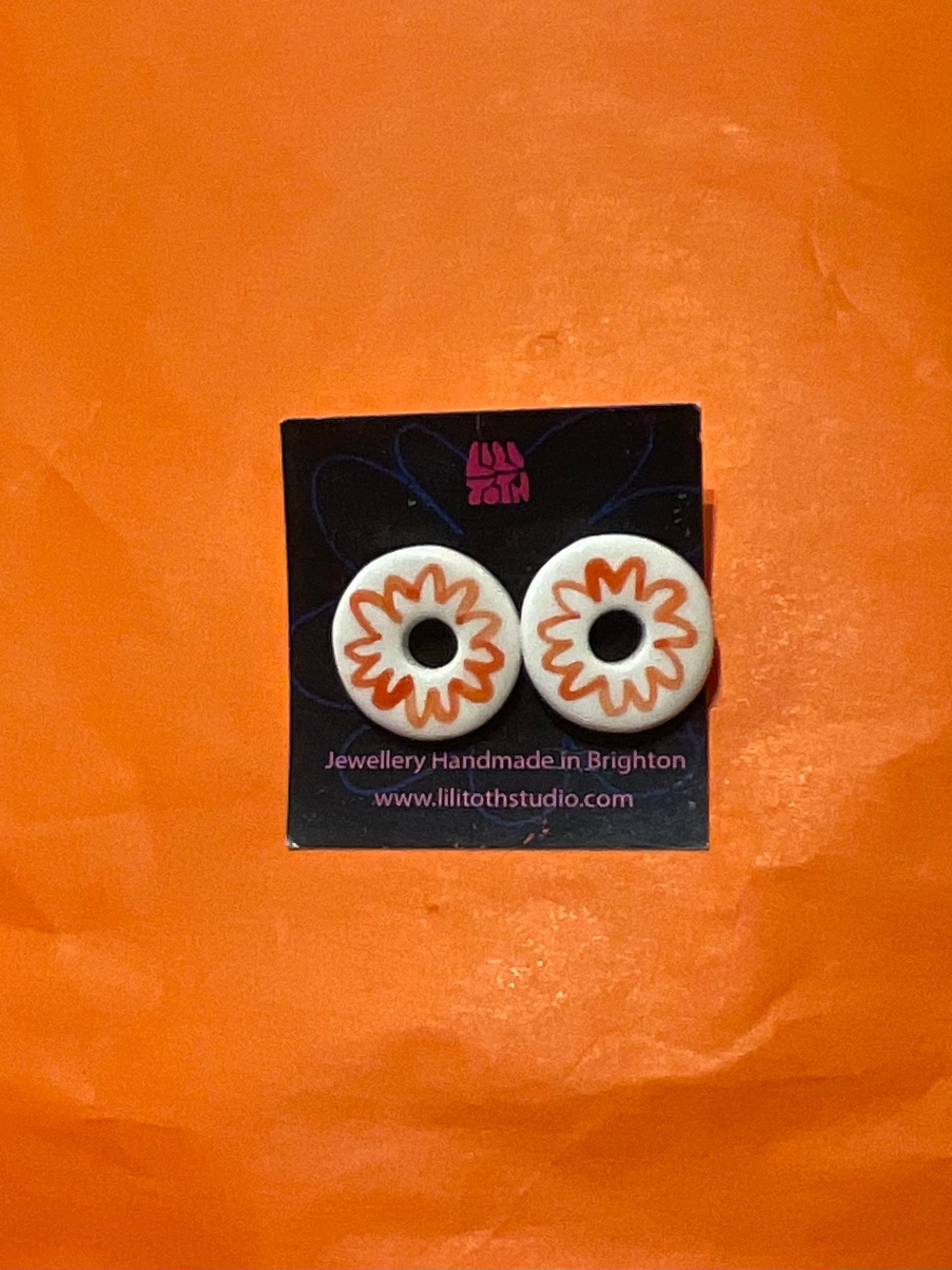 Circular Daisy Ceramic Earrings by Lili Toth