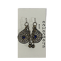 A pair of silver-toned teardrop dangle earrings with blue evil eye stones and small hanging beads, displayed on a white card labeled 'eclectera'.
