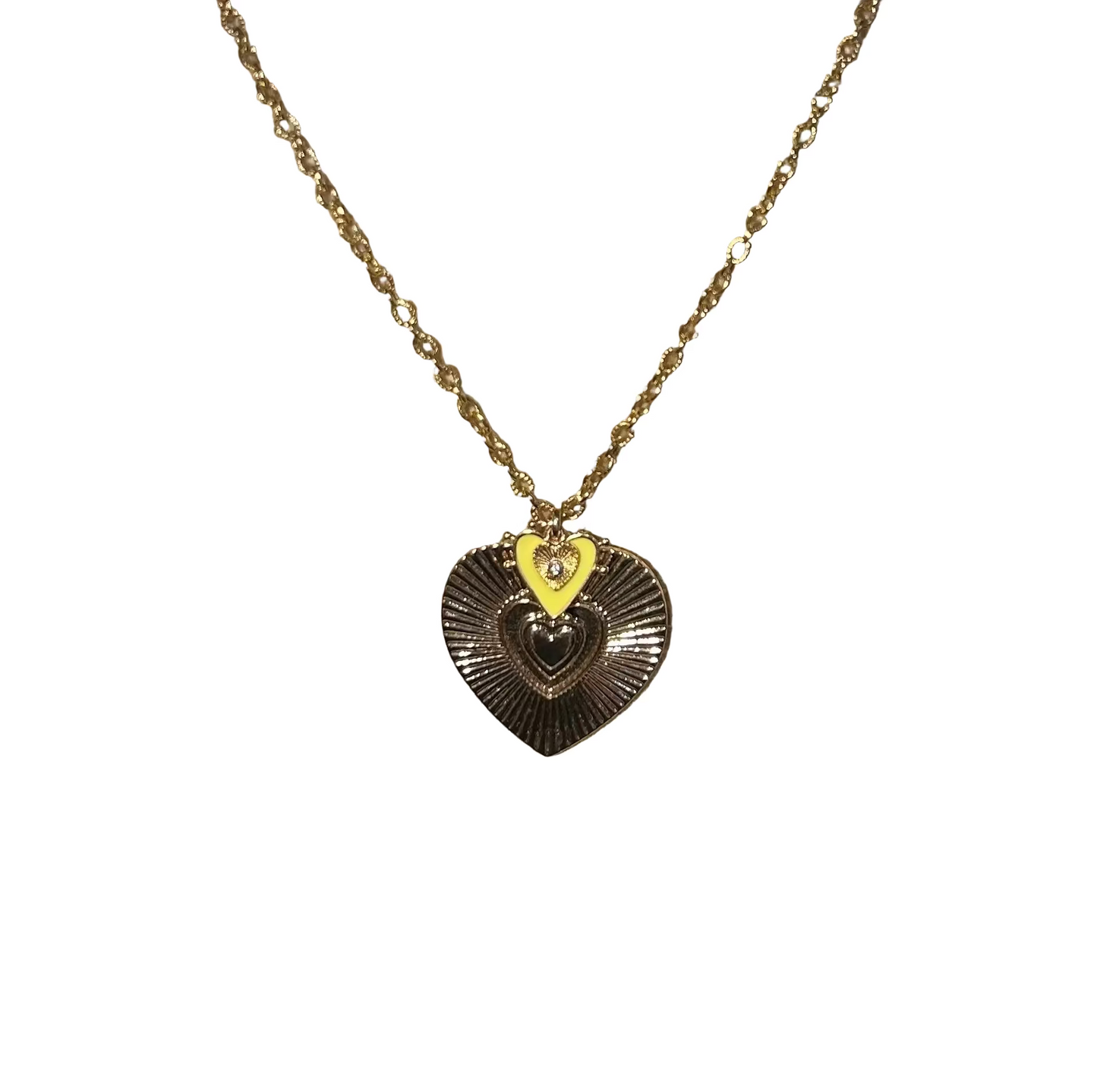 Necklace with a heart-shaped pendant on a mannequin bust.
