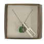 necklace in sterling silver with seglass pendant from cornwall and a silver pendant engraved with a seahorse.