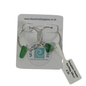 Sterling silver hoop earrings with small green seaglass tips, displayed on a branded white backing card with a price tag attached.