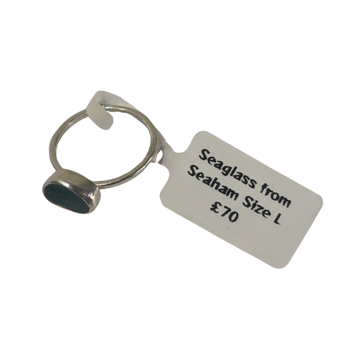 A silver-toned ring with a dark green seaglass stone from Seaham, Size L.