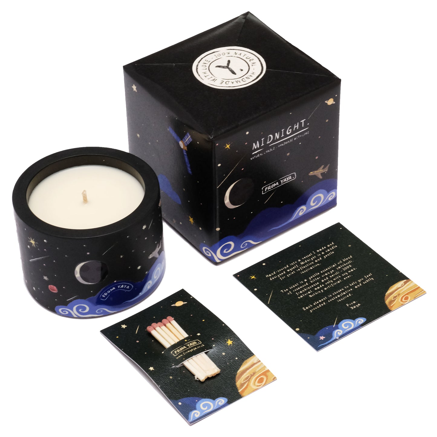 Candle with packaging, matches, and card on a white background