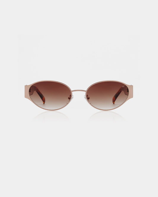 Sunglasses with a rose gold frame and brown gradient lenses on a white background
